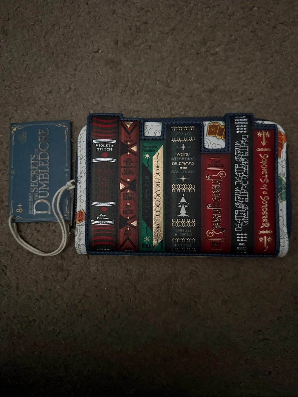 Loungefly Secrets of Dumbledore White Multi-Color Tablet Sleeve